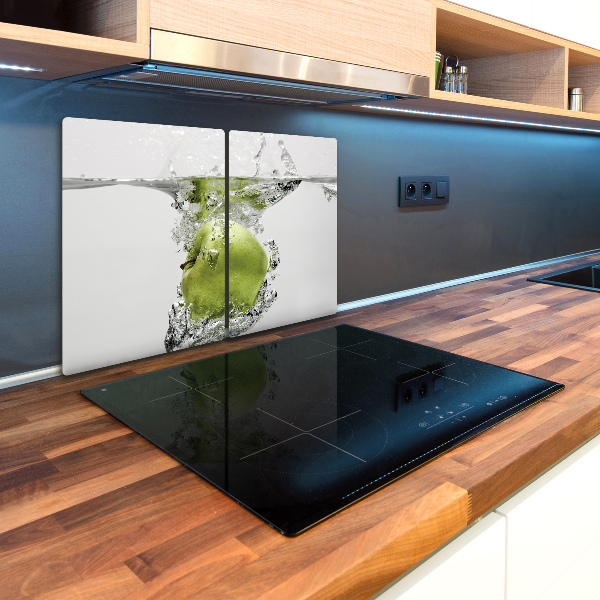 Chopping board glass Apple under water