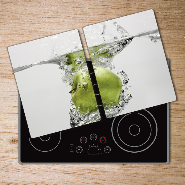 Chopping board glass Apple under water