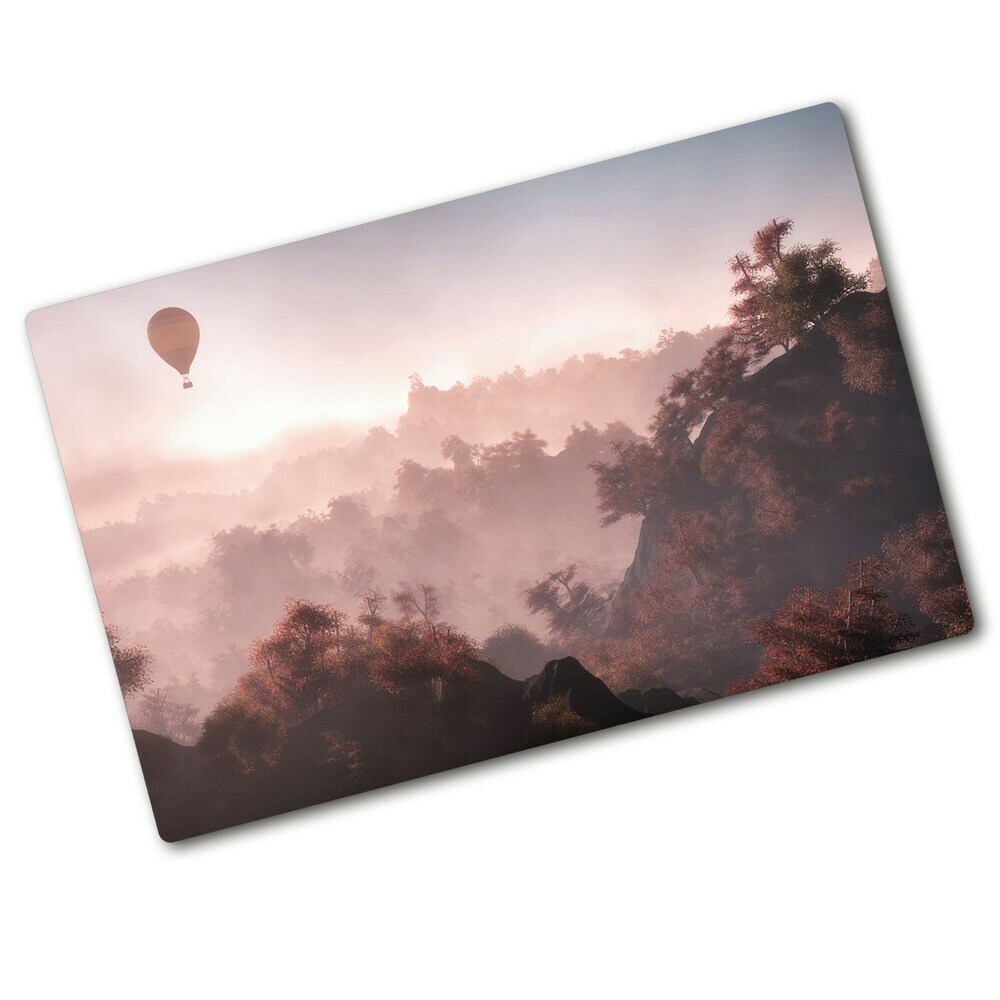 Chopping board glass Balloon above the forest