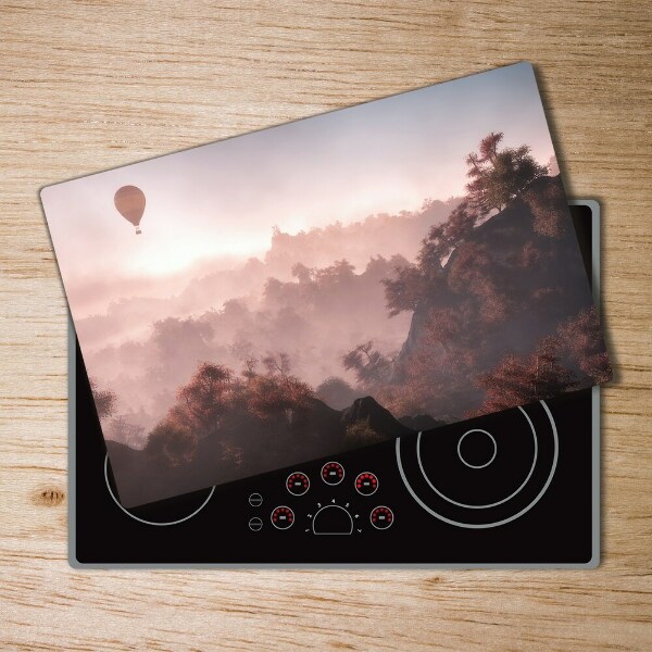 Chopping board glass Balloon above the forest