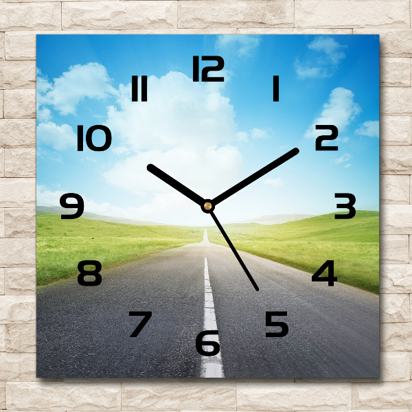 Square glass wall clock Road through the meadow