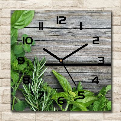 Square kitchen clock Wooden background herbs