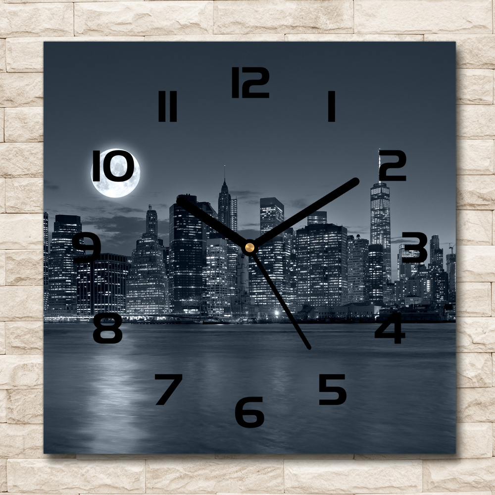 Square glass clock New York at night