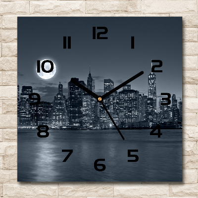 Square glass clock New York at night