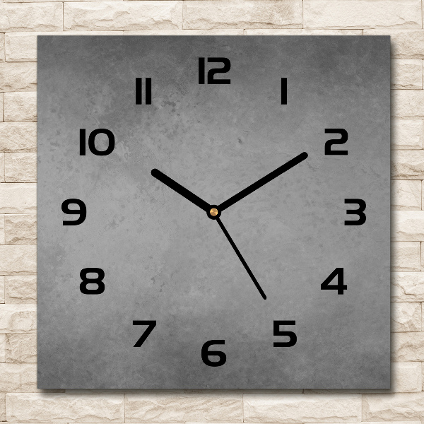 Square glass wall clock Concrete background