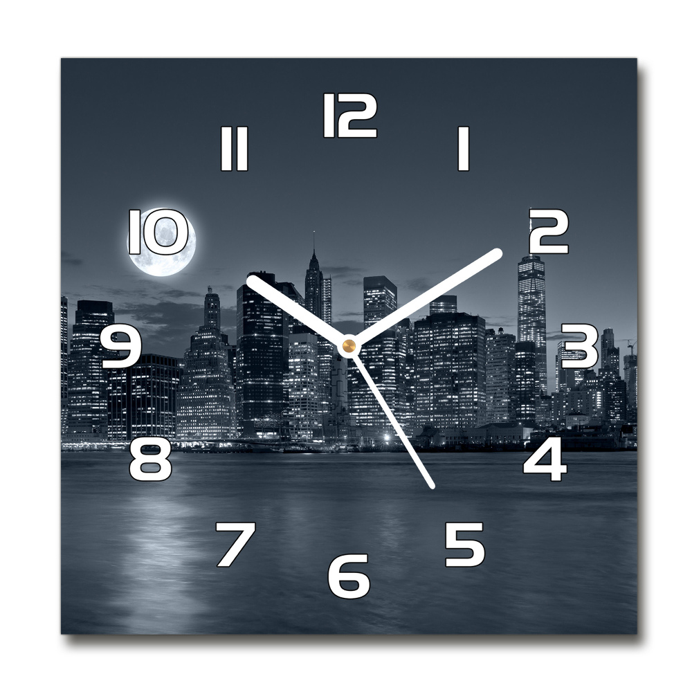 Square glass clock New York at night