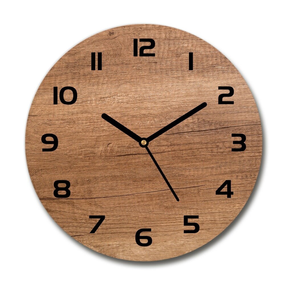 Round glass clock Wooden background