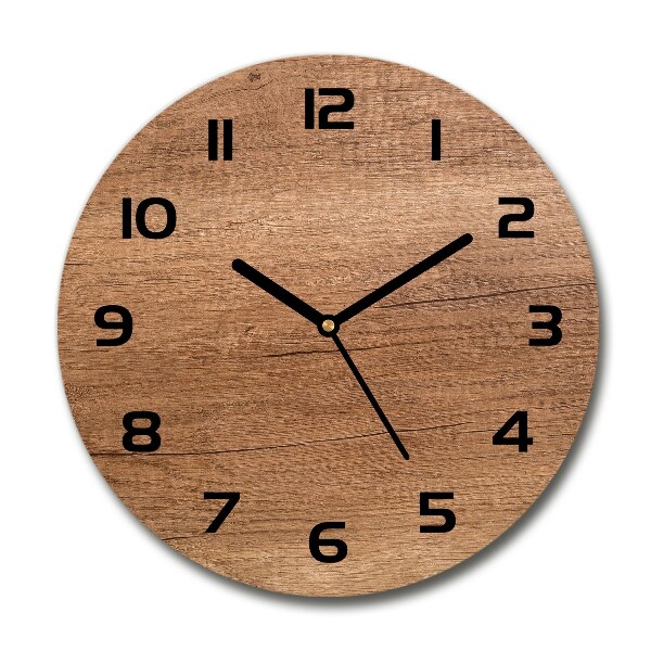 Round glass clock Wooden background