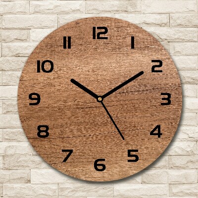 Round glass clock Wooden background