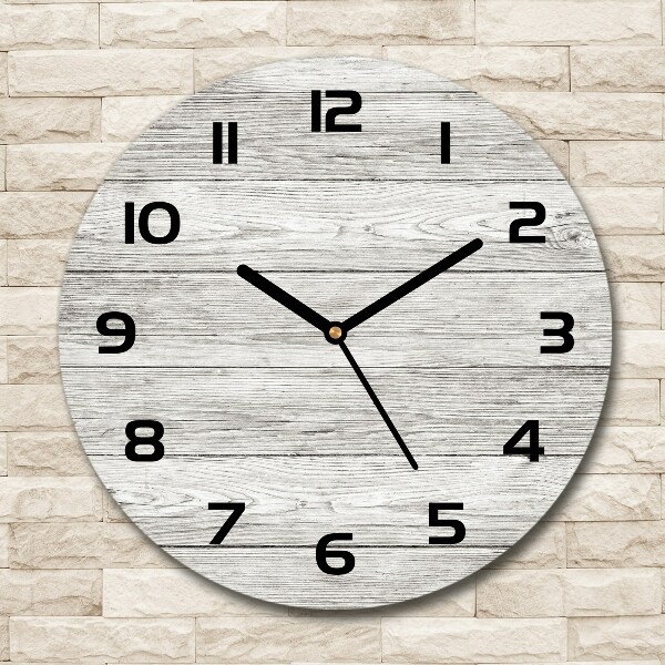 Round clock glass Wooden background