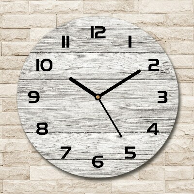 Round clock glass Wooden background