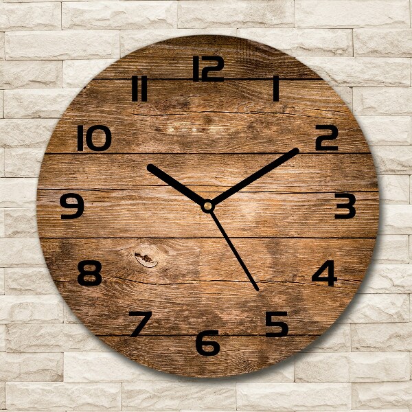 Round wall clock Wooden background