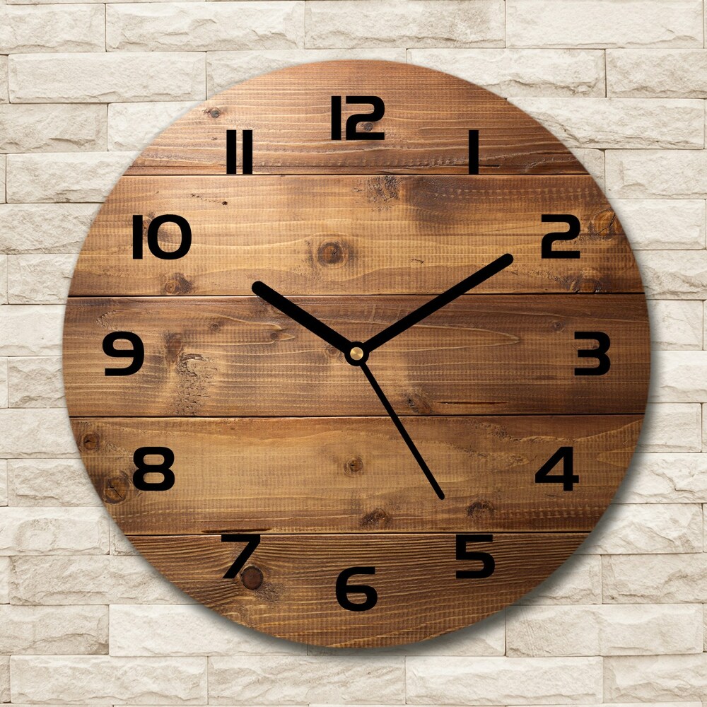 Round wall clock Wooden background