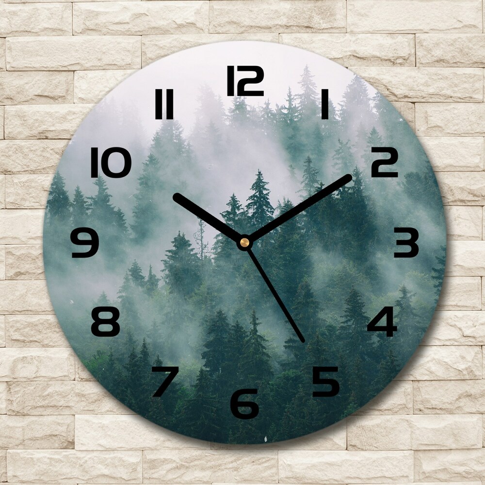 Round wall clock Fog over the forest