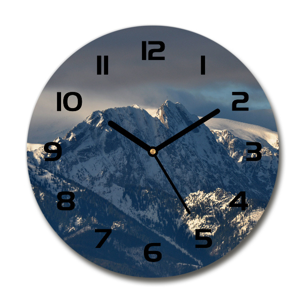 Round wall clock Giewont in winter