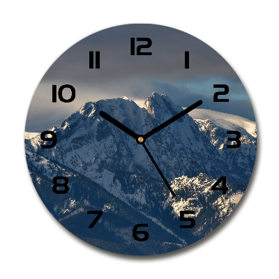 Round wall clock Giewont in winter