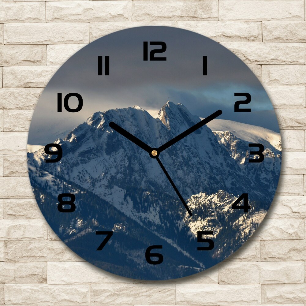 Round wall clock Giewont in winter