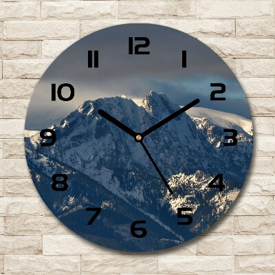 Round wall clock Giewont in winter