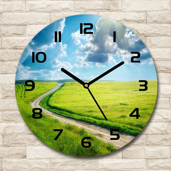 Round wall clock Path in the meadow