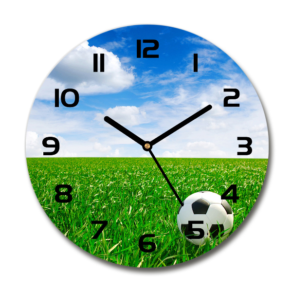 Round glass clock Football in the meadow