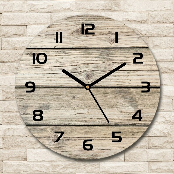 Round wall clock Wooden background