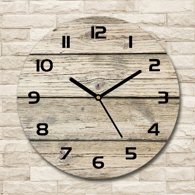 Round wall clock Wooden background