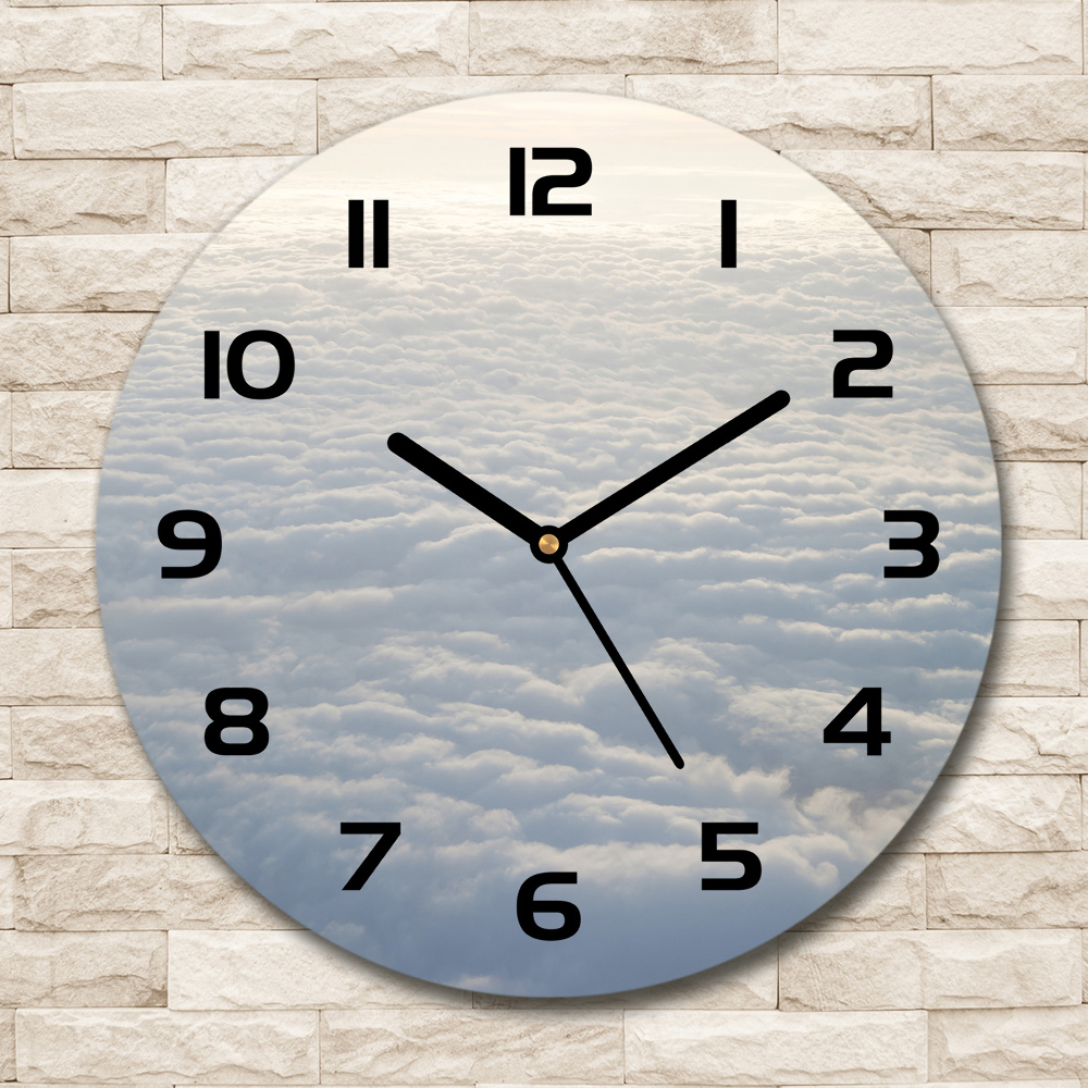 Round wall clock Flight over the clouds