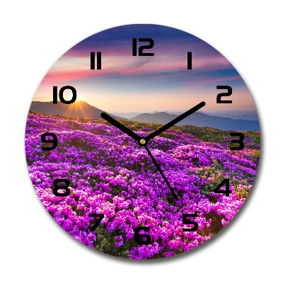 Round glass clock Flowers in the mountains