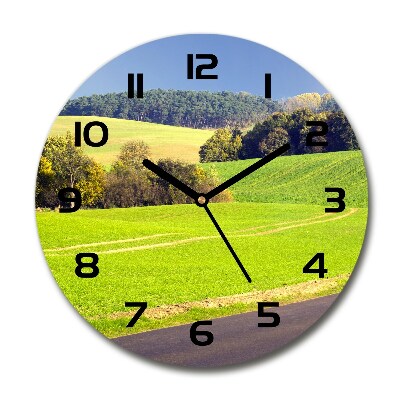 Round clock glass dirt road