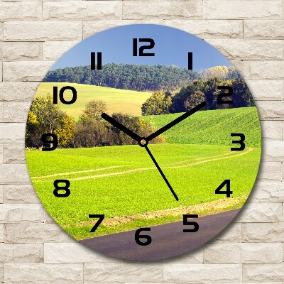 Round clock glass dirt road