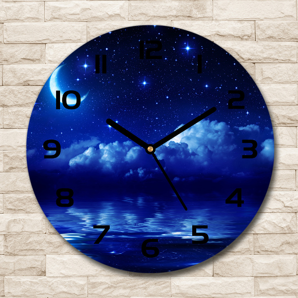 Round glass clock Sky at night