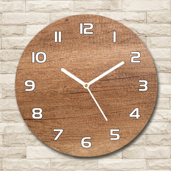 Round glass clock Wooden background