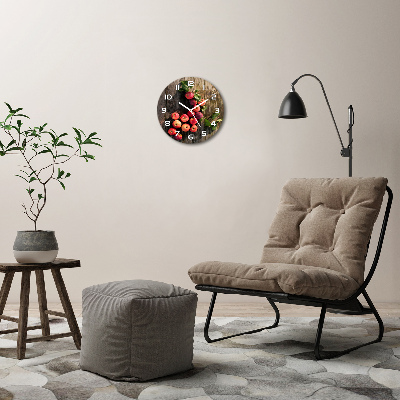 Round glass clock Apples on the table