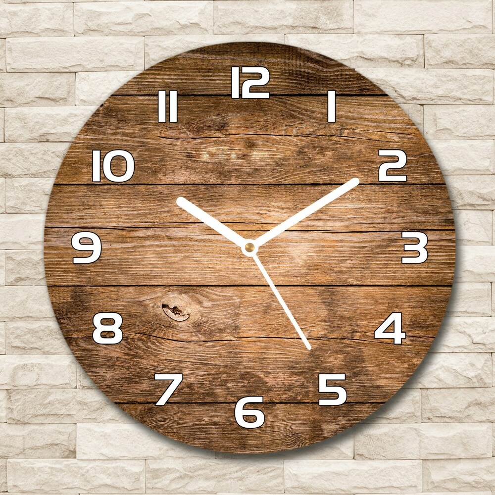 Round wall clock Wooden background