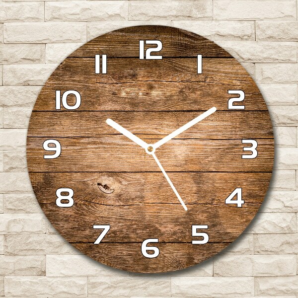 Round wall clock Wooden background