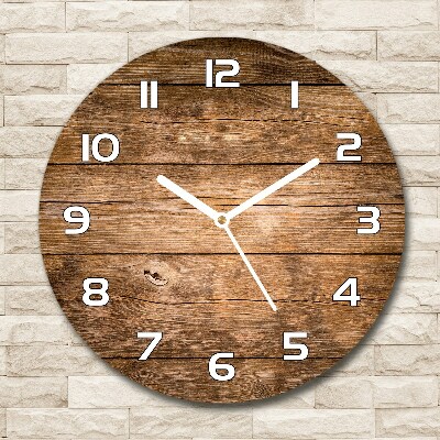 Round wall clock Wooden background