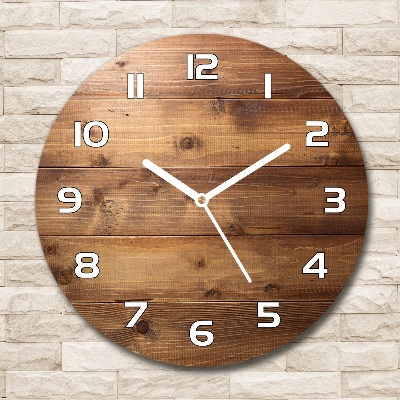 Round wall clock Wooden background