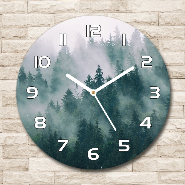 Round wall clock Fog over the forest