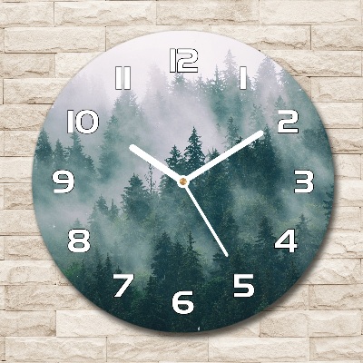 Round wall clock Fog over the forest