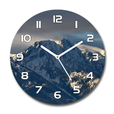 Round wall clock Giewont in winter