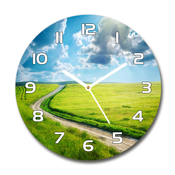 Round wall clock Path in the meadow