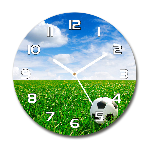 Round glass clock Football in the meadow