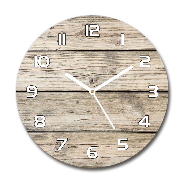 Round wall clock Wooden background