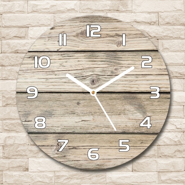 Round wall clock Wooden background