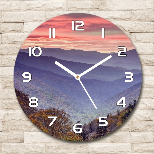 Round wall clock Sunset of the mountain