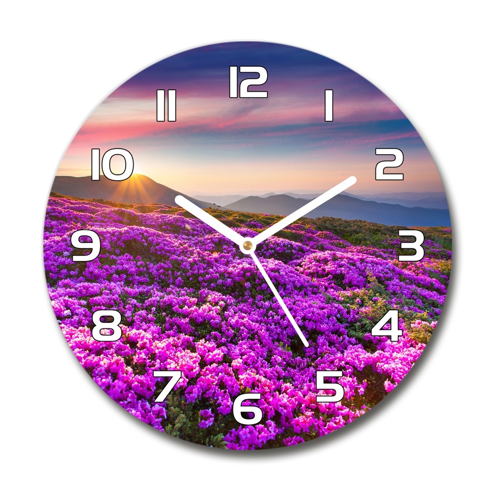 Round glass clock Flowers in the mountains