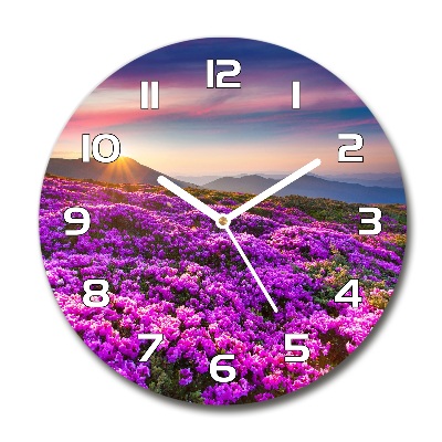 Round glass clock Flowers in the mountains