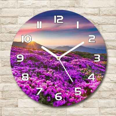 Round glass clock Flowers in the mountains