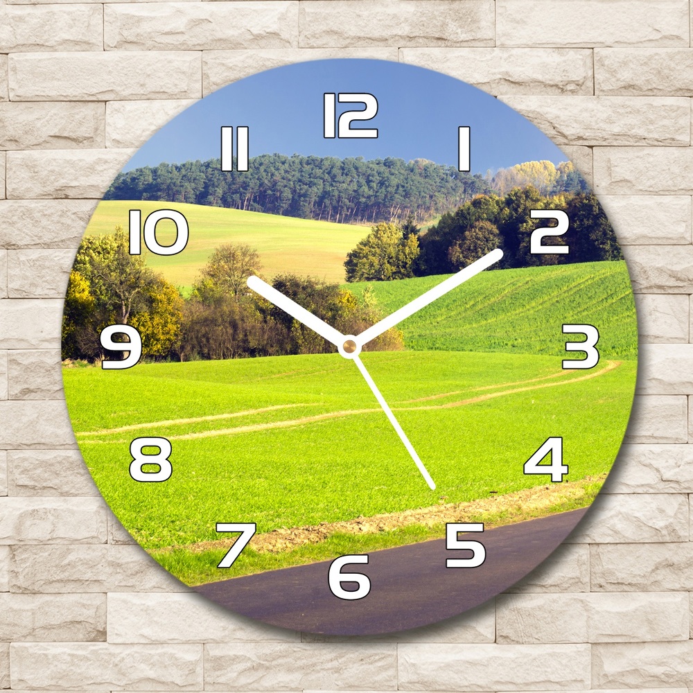 Round clock glass dirt road