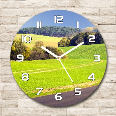 Round clock glass dirt road